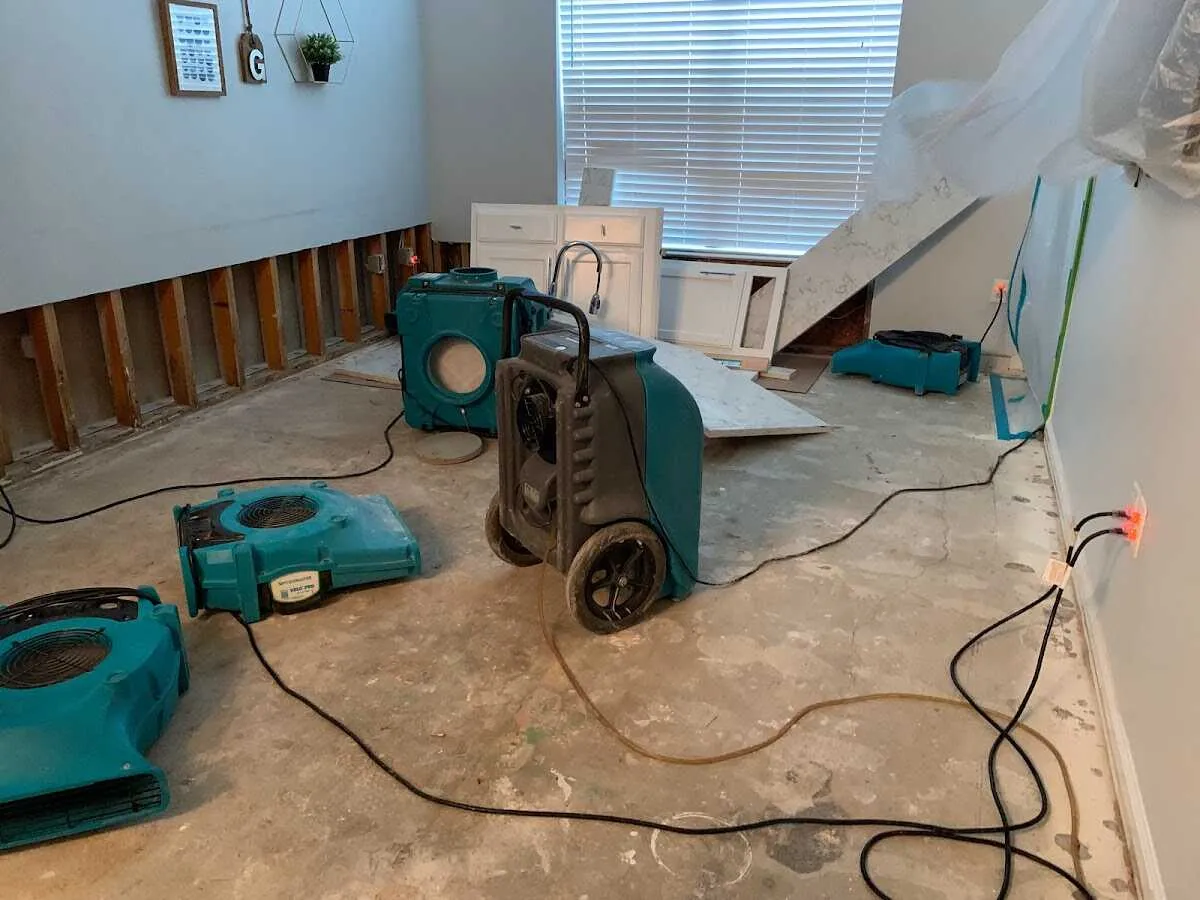 Dehumidifier in flood-cut room for Water Damage Restoration in Greenwood